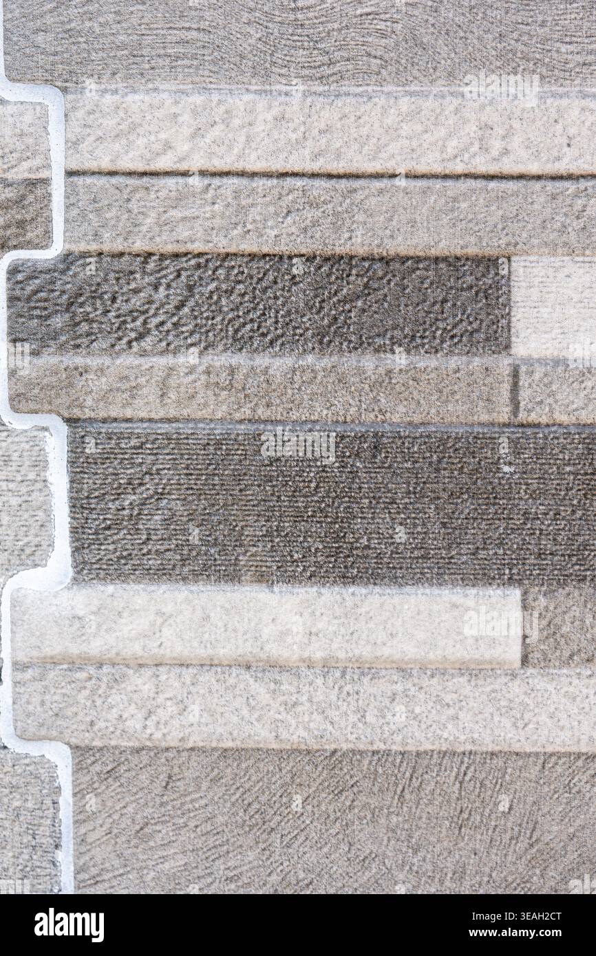 Contemporary Architecture Background: Seamless Pattern of Gray Stacked Bricks or Stone Veneer Stock Photo