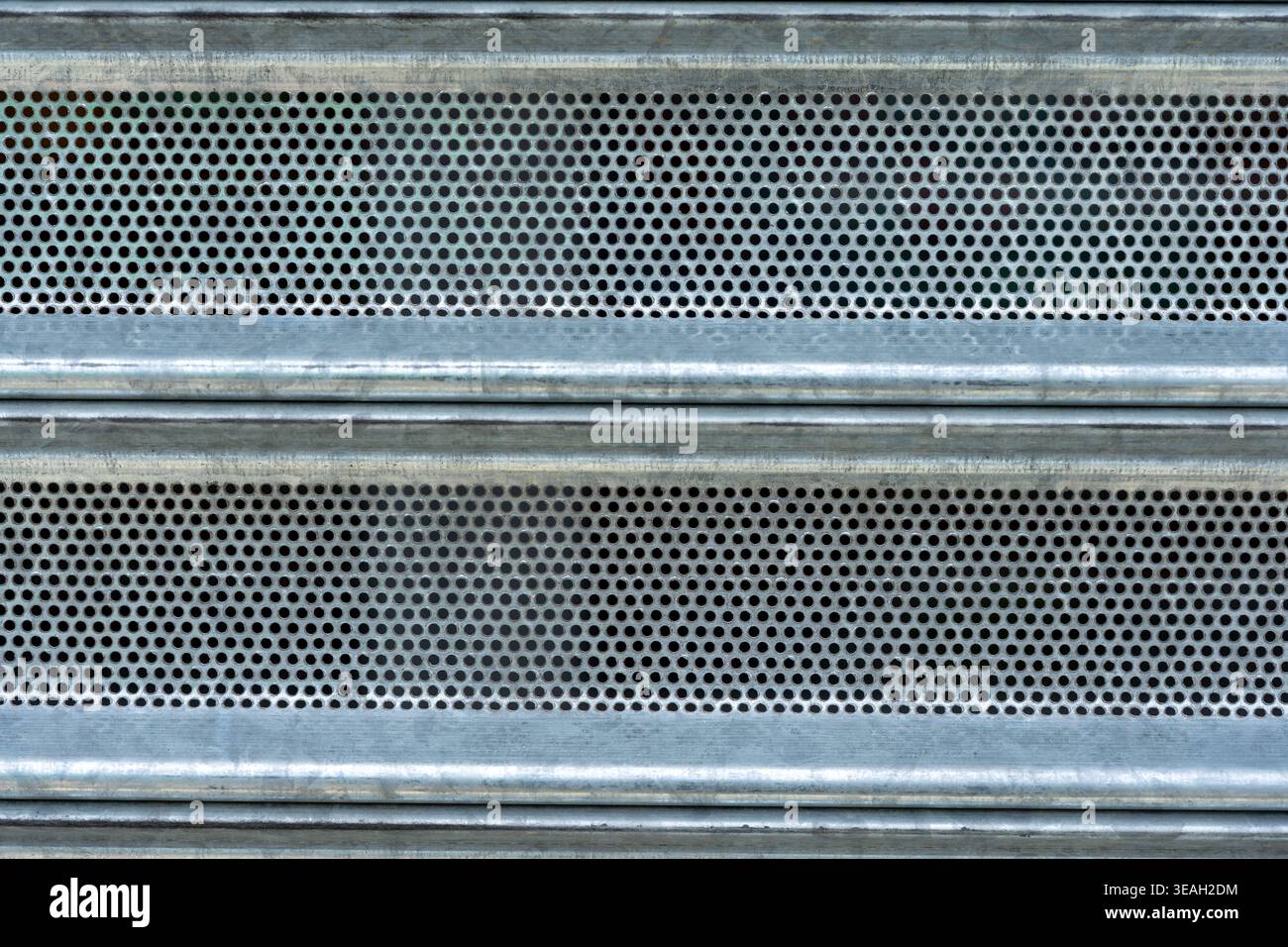 Galvanized Perforated Metal Security Shutter Texture with Horizontal Slats and Pattern Stock Photo