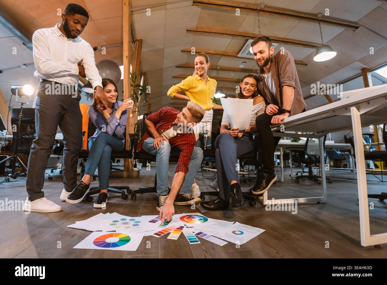 Professional designers working on project in office Stock Photo