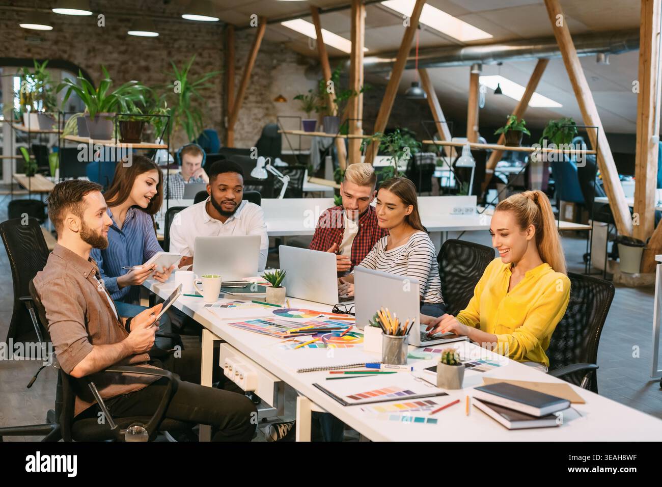 Team of young designers working on new project Stock Photo