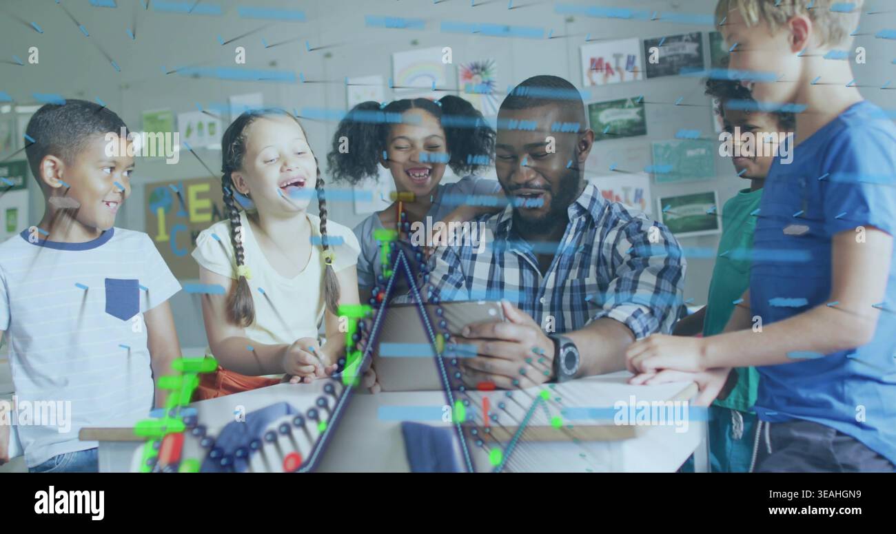 Showing teacher teaching on tablet at school while six children lean in, with abacus Stock Photo
