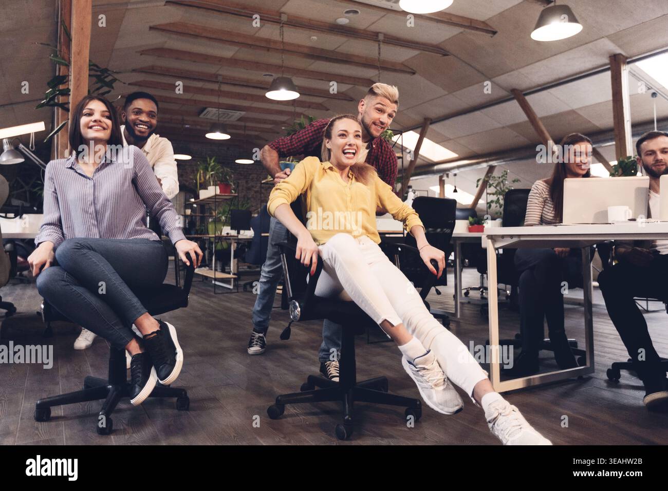 Business team of software developers having fun in office Stock Photo