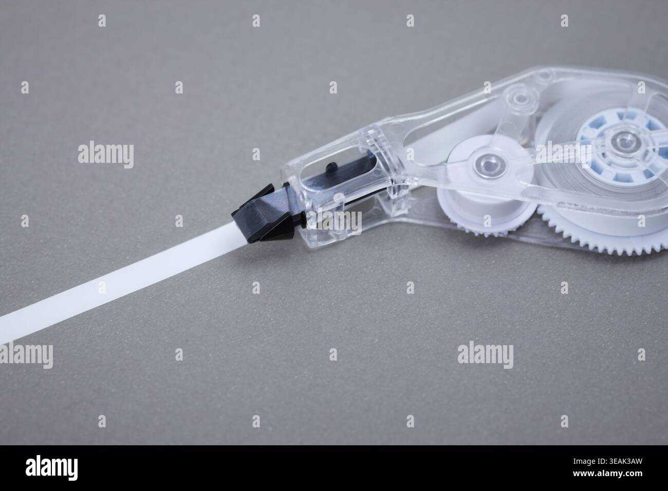 correction tape on grey background Stock Photo