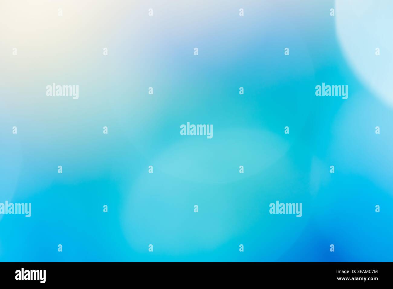 Soft blue and turquoise abstract blurred gradient background with bokeh light effect Stock Photo