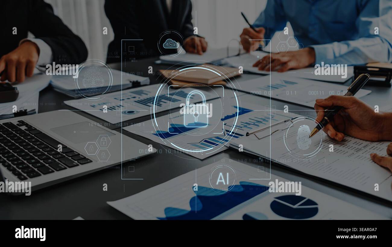 A modern office scene with professionals engaged in a meeting focused on data analytics and cybersecurity, featuring documents and technology elements Stock Photo