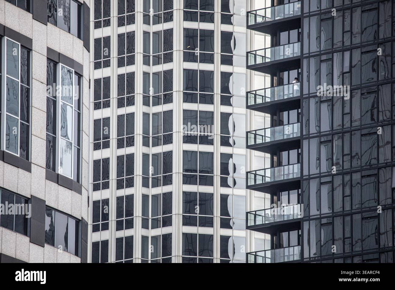A man stands on a balcony. Buildings, downtown Los Angeles, California, United States of America Stock Photo