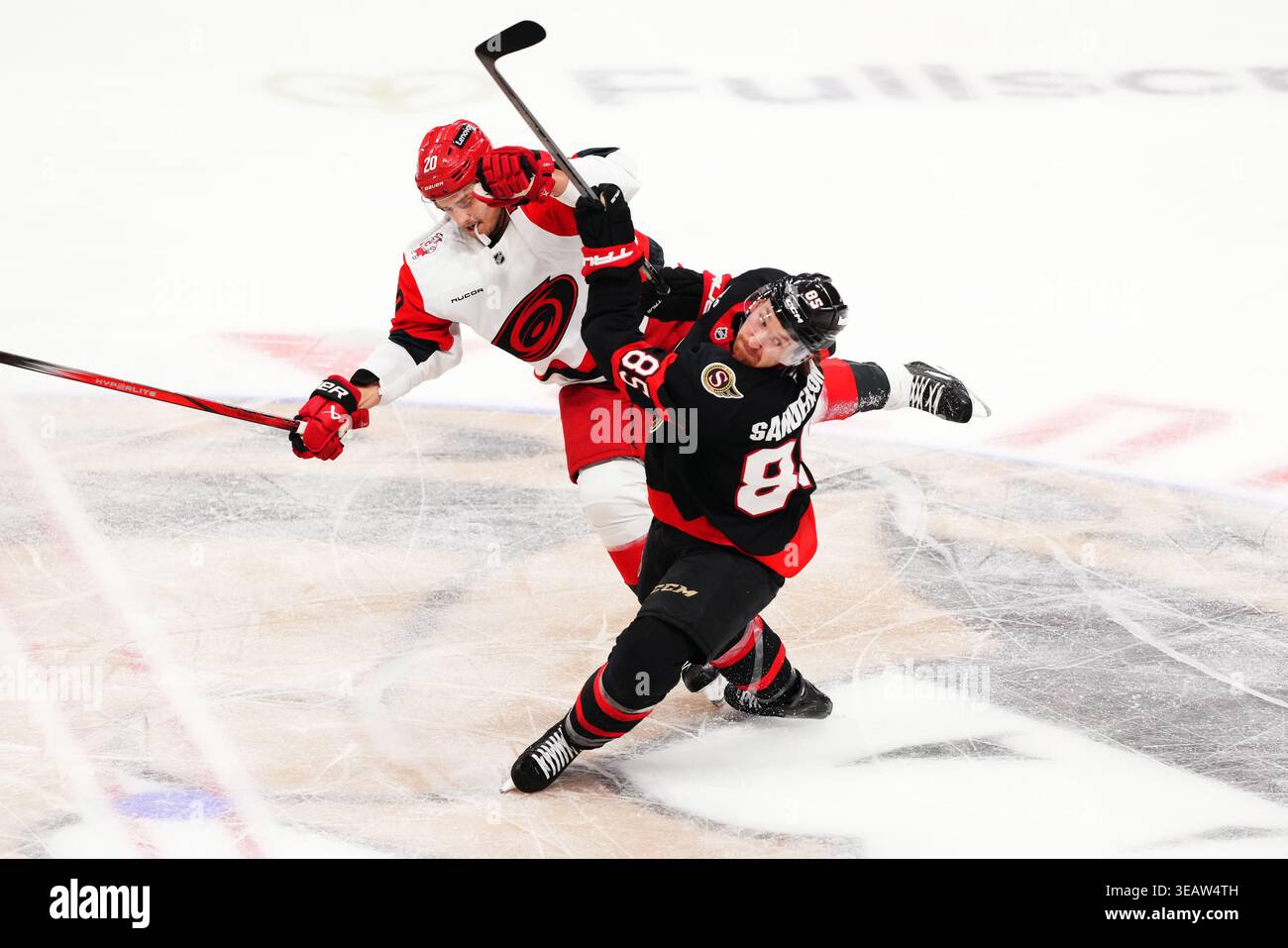 Jake Kilpatrick Carolina Hurricanes' Sebastian Aho (20) and Ottawa Senators' Jake ...