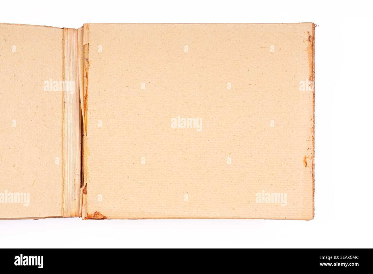 vintage handmade paper book opened to blank page as scrapbook or journal background Stock Photo