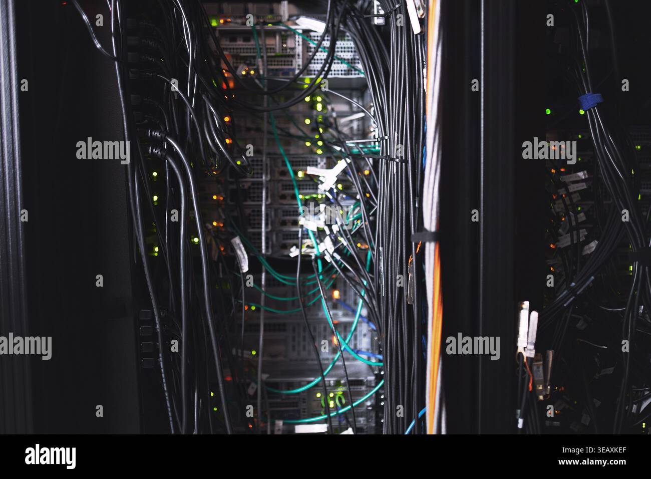 Hardware, wiring or computing equipment in server room for database storage, cybersecurity or tech. IT infrastructure, rack or cables in data center Stock Photo
