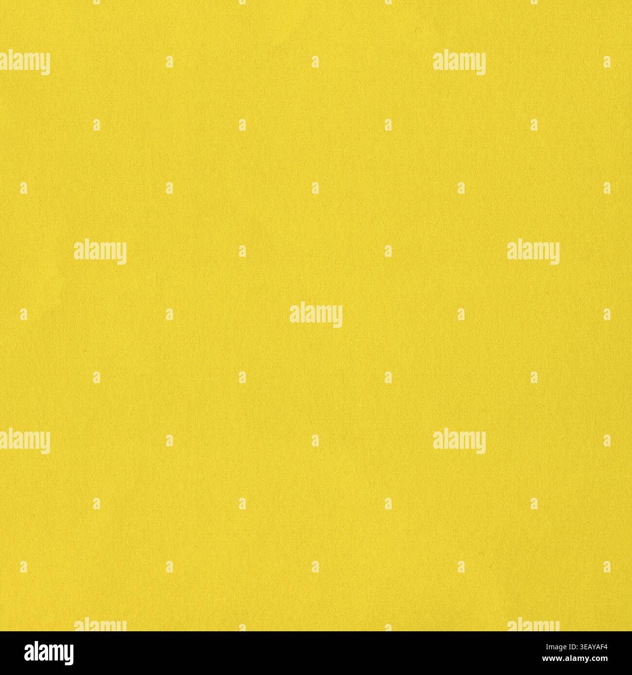 Yellow colour paper useful as a background texture Stock Photo