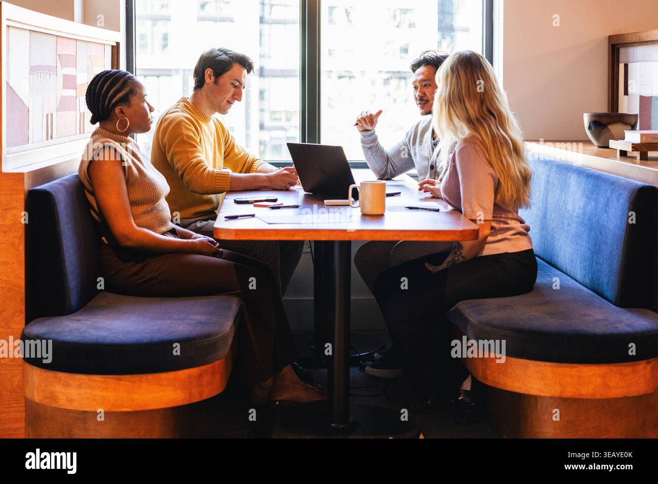 Young Team working together in a modern office Stock Photo