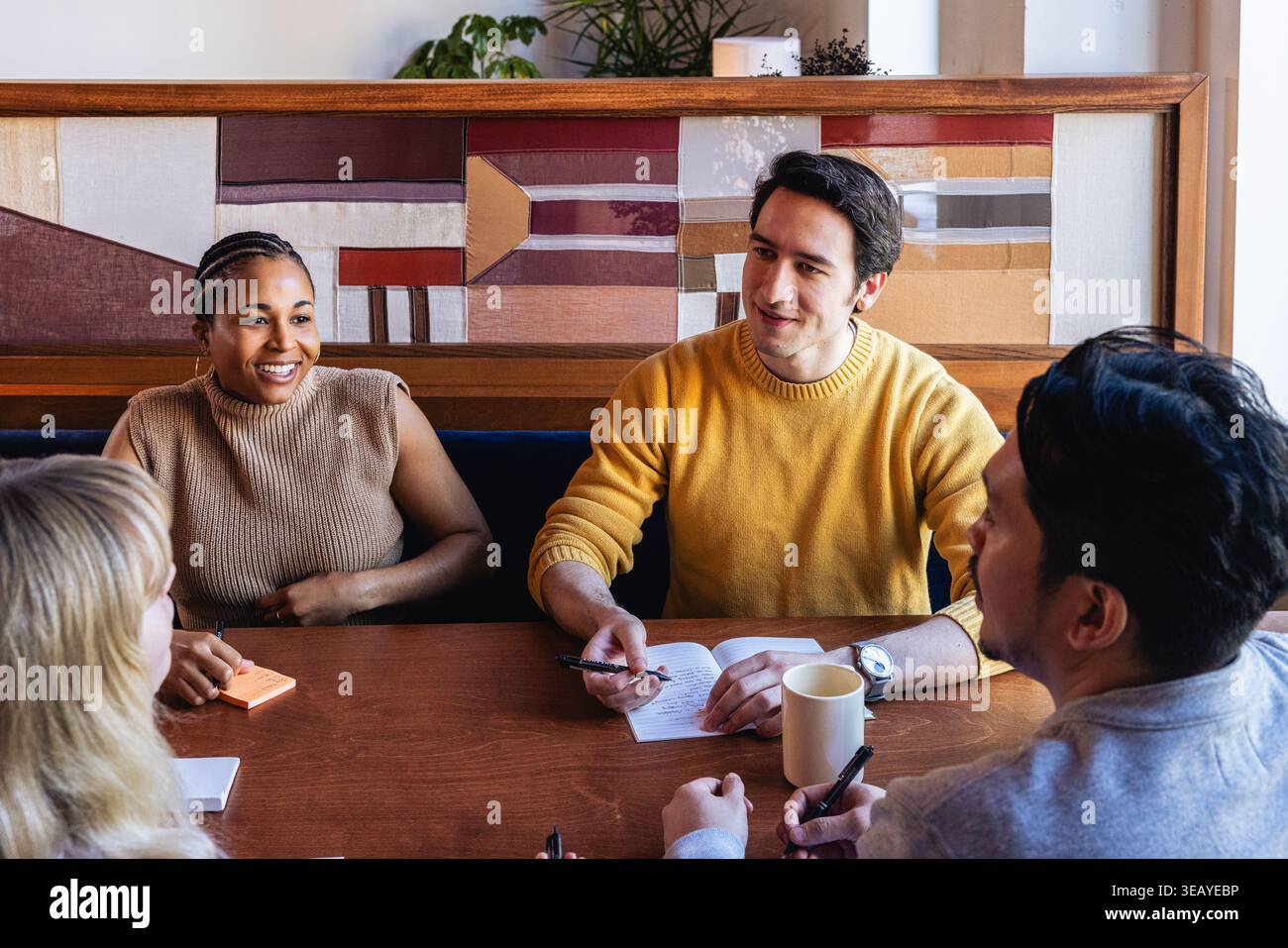Young Office Team Collaborating in Modern Environment Stock Photo