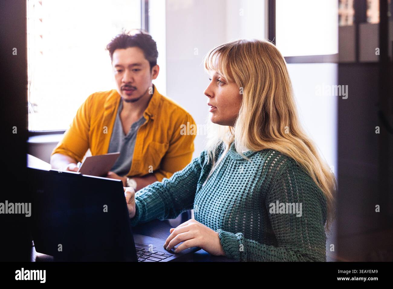 Multiracial Team Working on Computer At Office Stock Photo