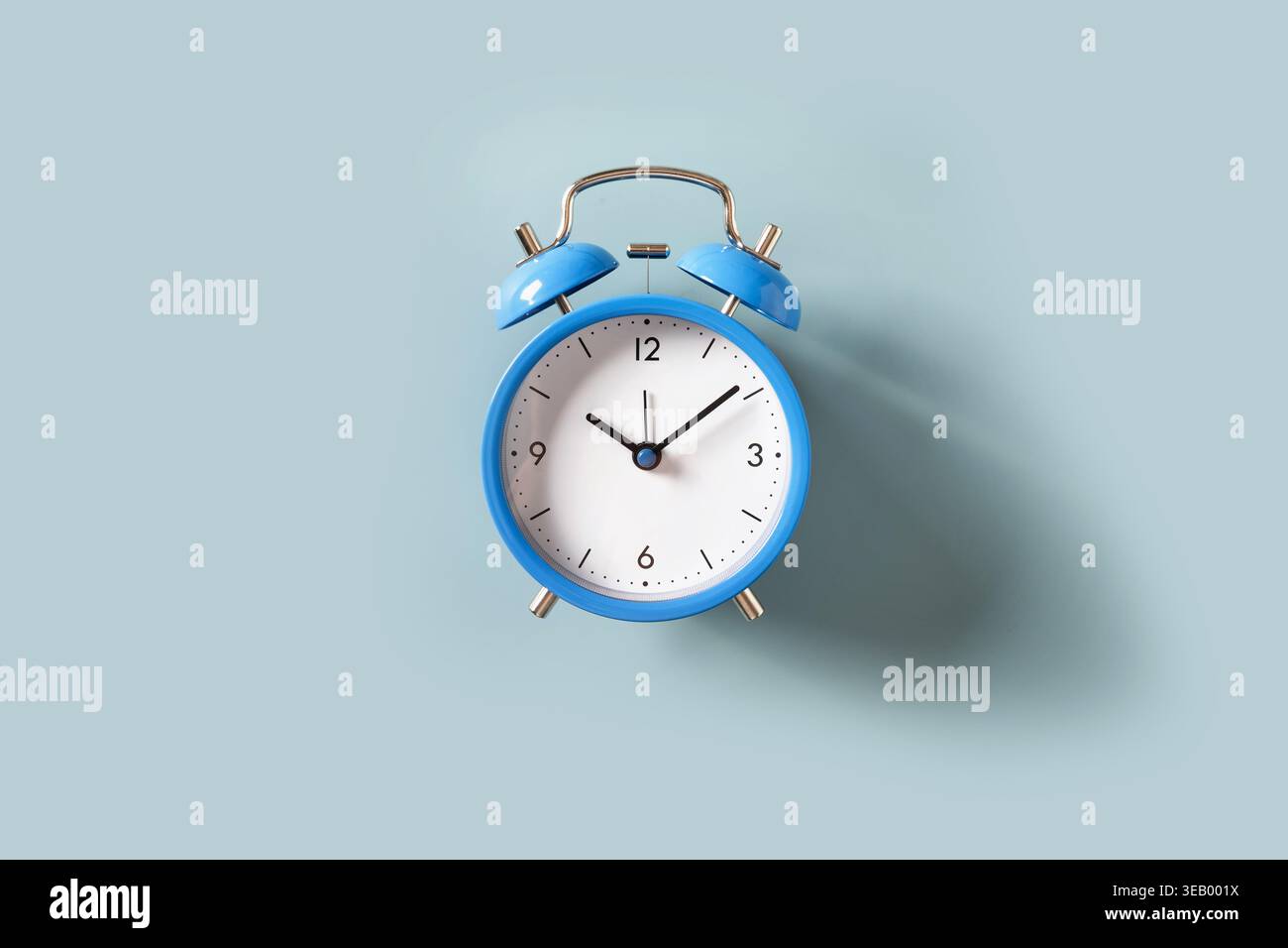 Blue alarm clock on pastel background time management deadline schedule planning and productivity concept Stock Photo