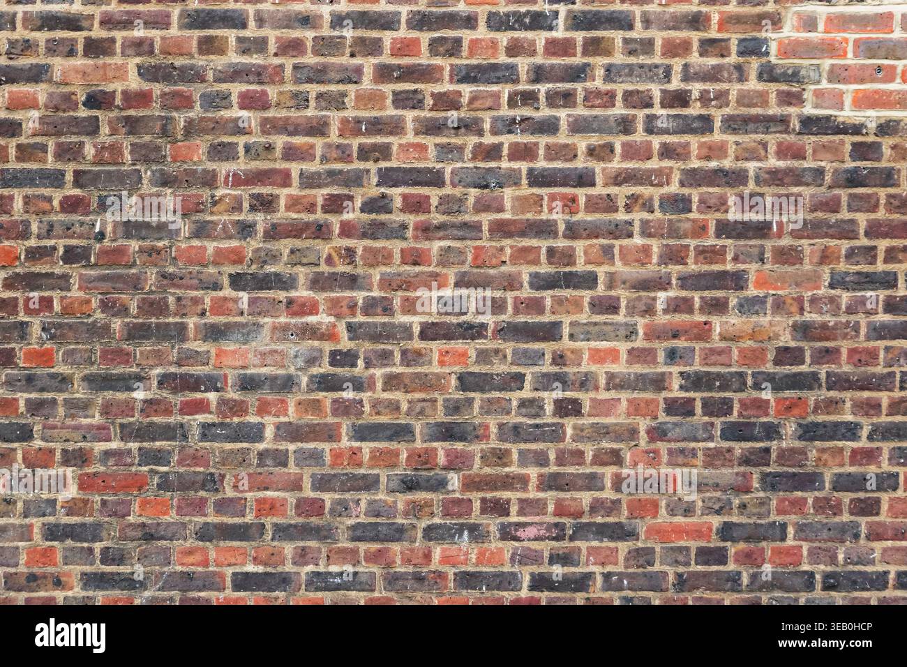 Red brick wall for background use, full frame Stock Photo