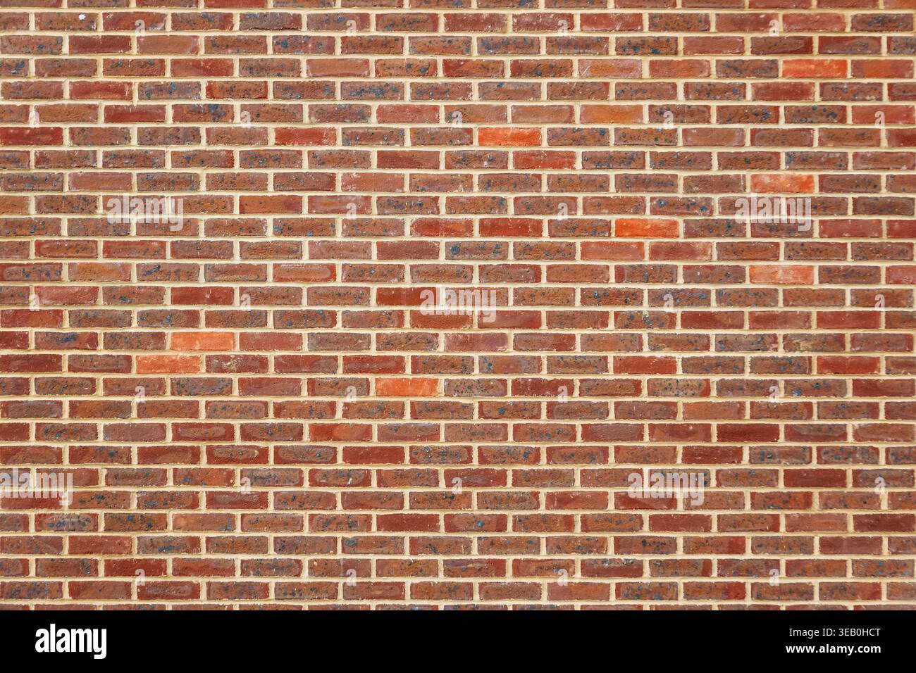 Red brick wall for background use, full frame Stock Photo