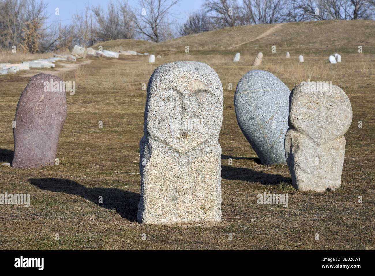 Kurgan stelae, Balbal, ancient historical stones on the territory of complex Burana Tower in Kyrgyzstan Stock Photo