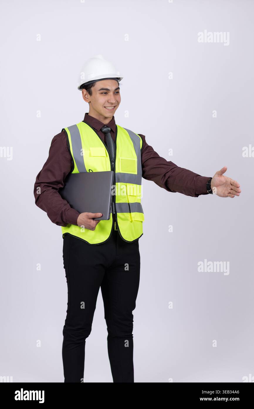Man in construction uniform gesturing for guidance Stock Photo