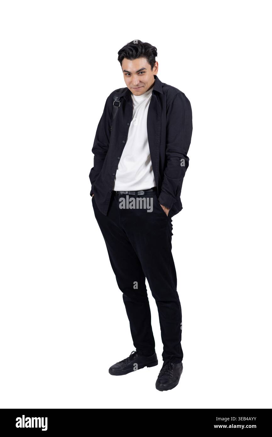 Confident young man standing and looking at camera Stock Photo