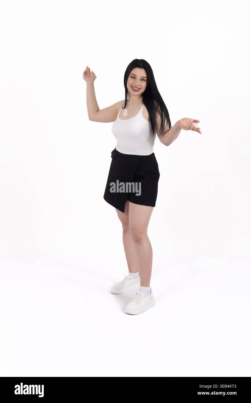 Happy woman celebrating with a success gesture Stock Photo