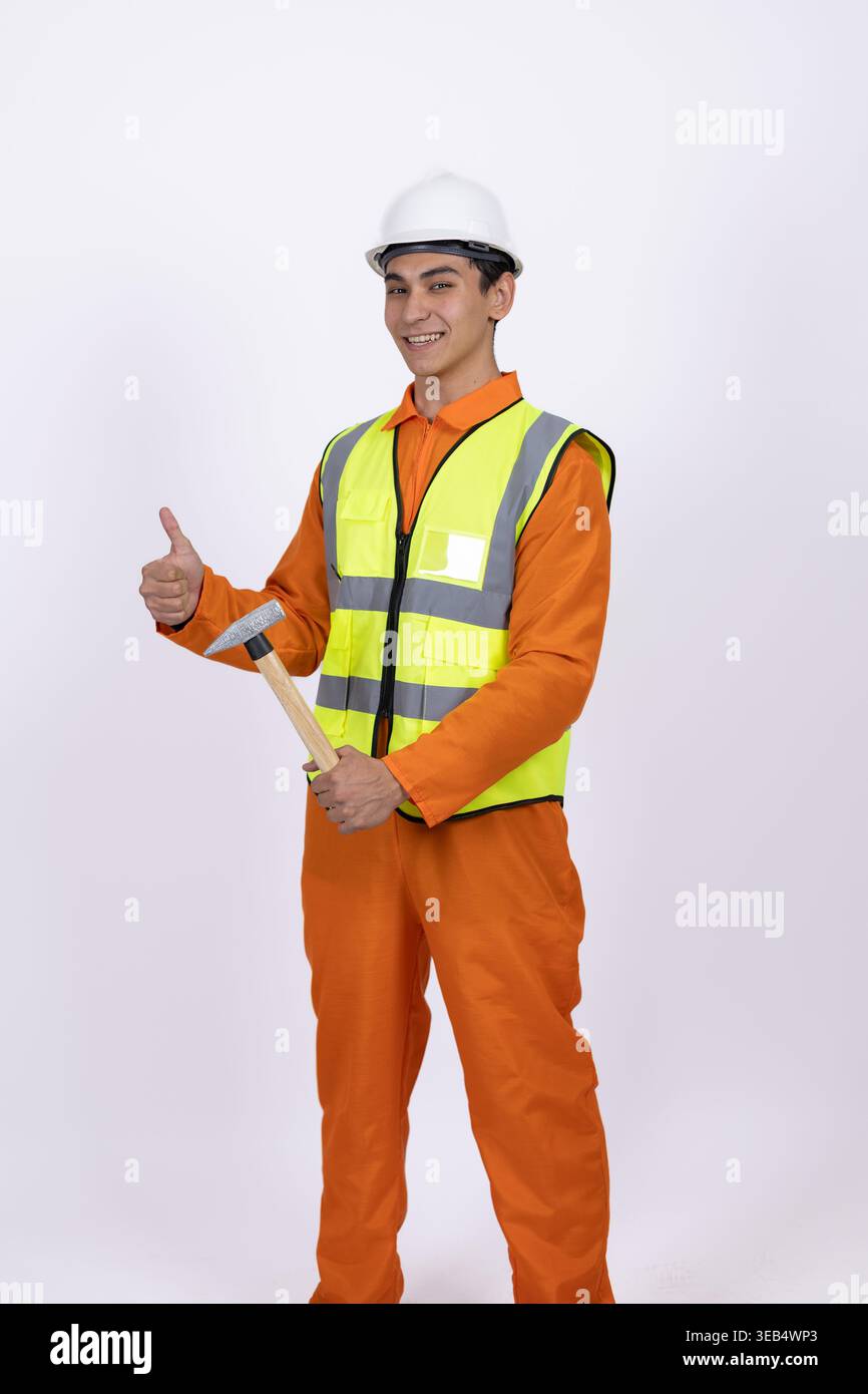 Worker in orange uniform showing thumb up Stock Photo