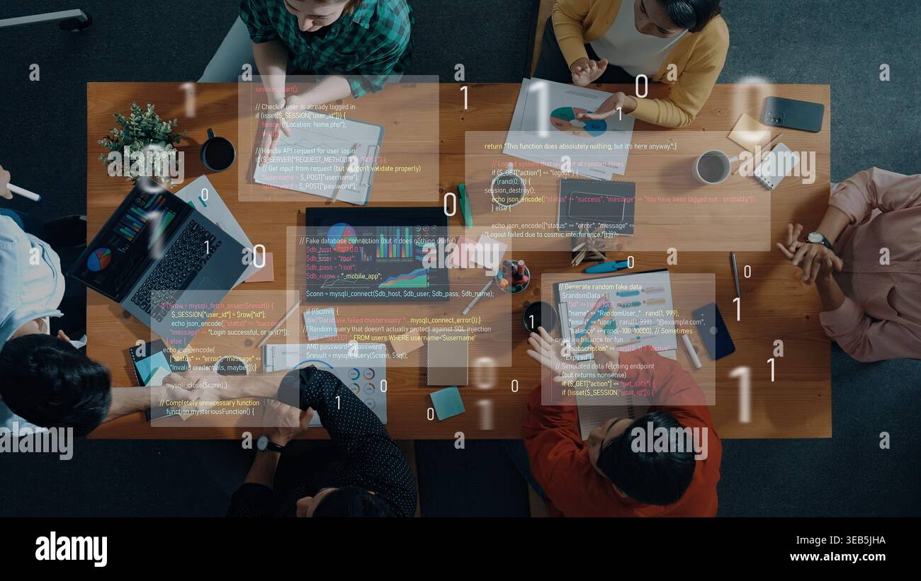 A diverse group of professionals engages in a collaborative brainstorming session, analyzing data and coding on laptops, creating innovative Stock Photo
