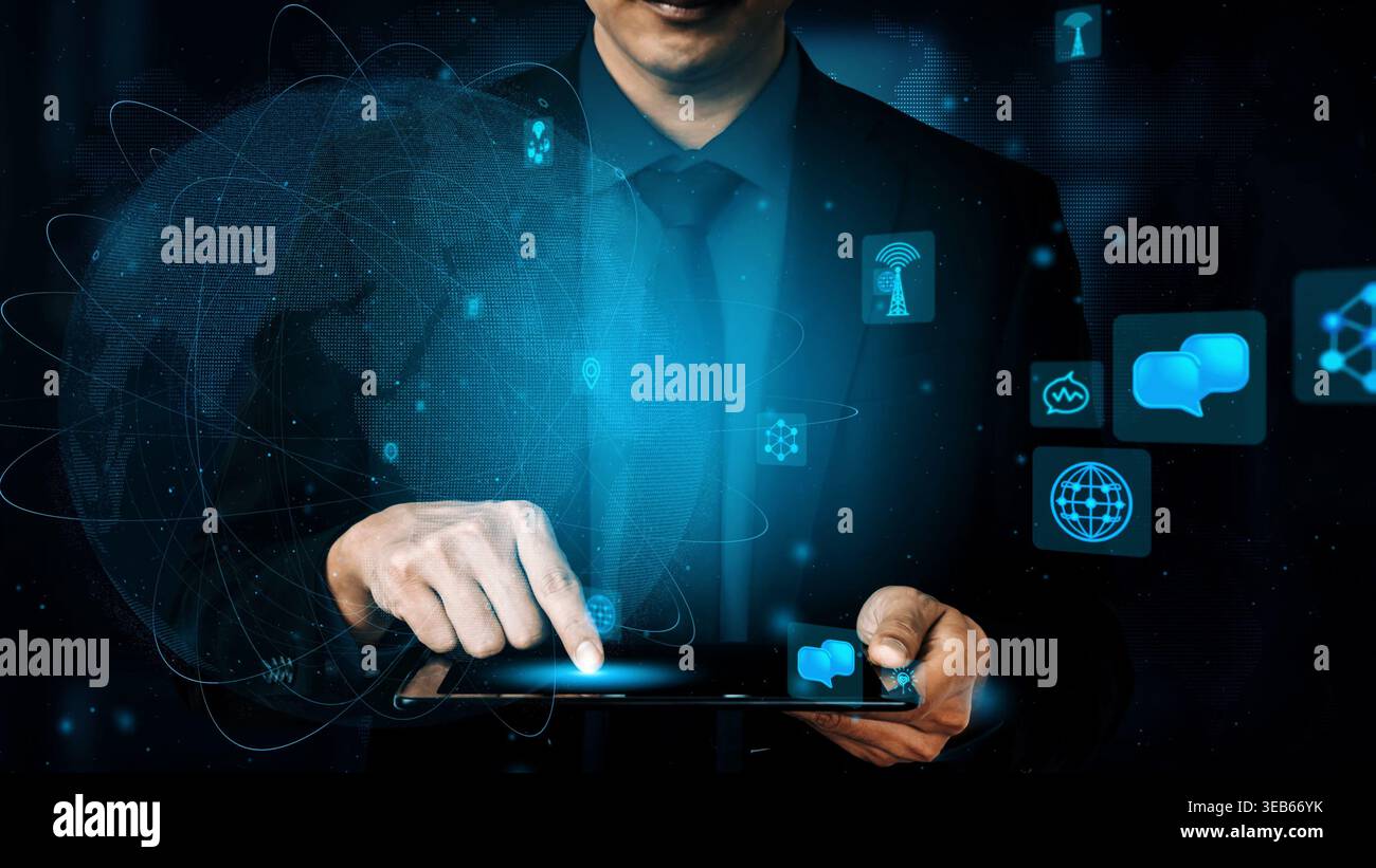 A businessman interacts with a tablet, showcasing digital icons and global networks, symbolizing the intersection of technology and communication in Stock Photo