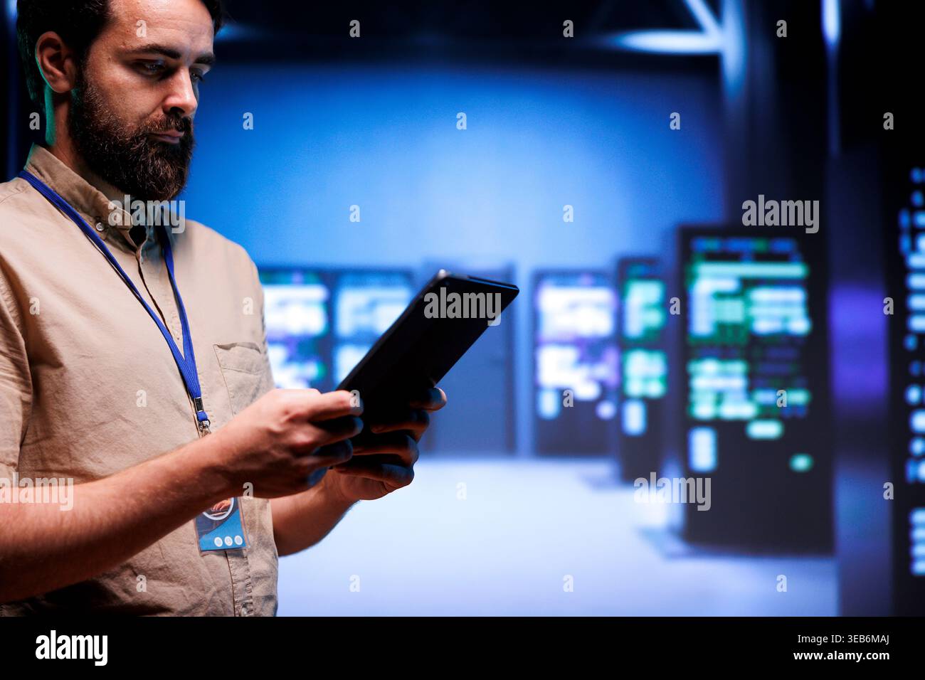 Adept system administrator doing maintenance on interlinked computers creating server network. Data storage service business using parallel computing to perform complex computing operations Stock Photo