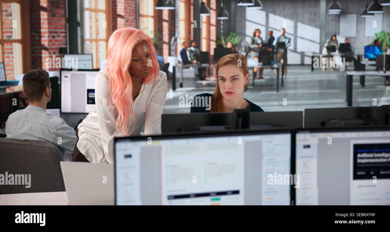 Business Analyst Studies Detailed Risk Data On Office Computers Today Carefully. Stock Photo