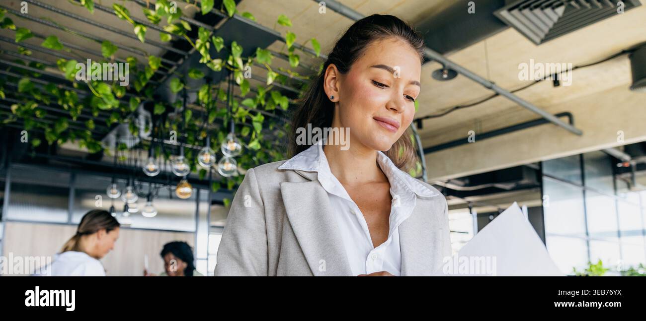 Licensed inspector analyzes environmental statistics using multiple tools Stock Photo