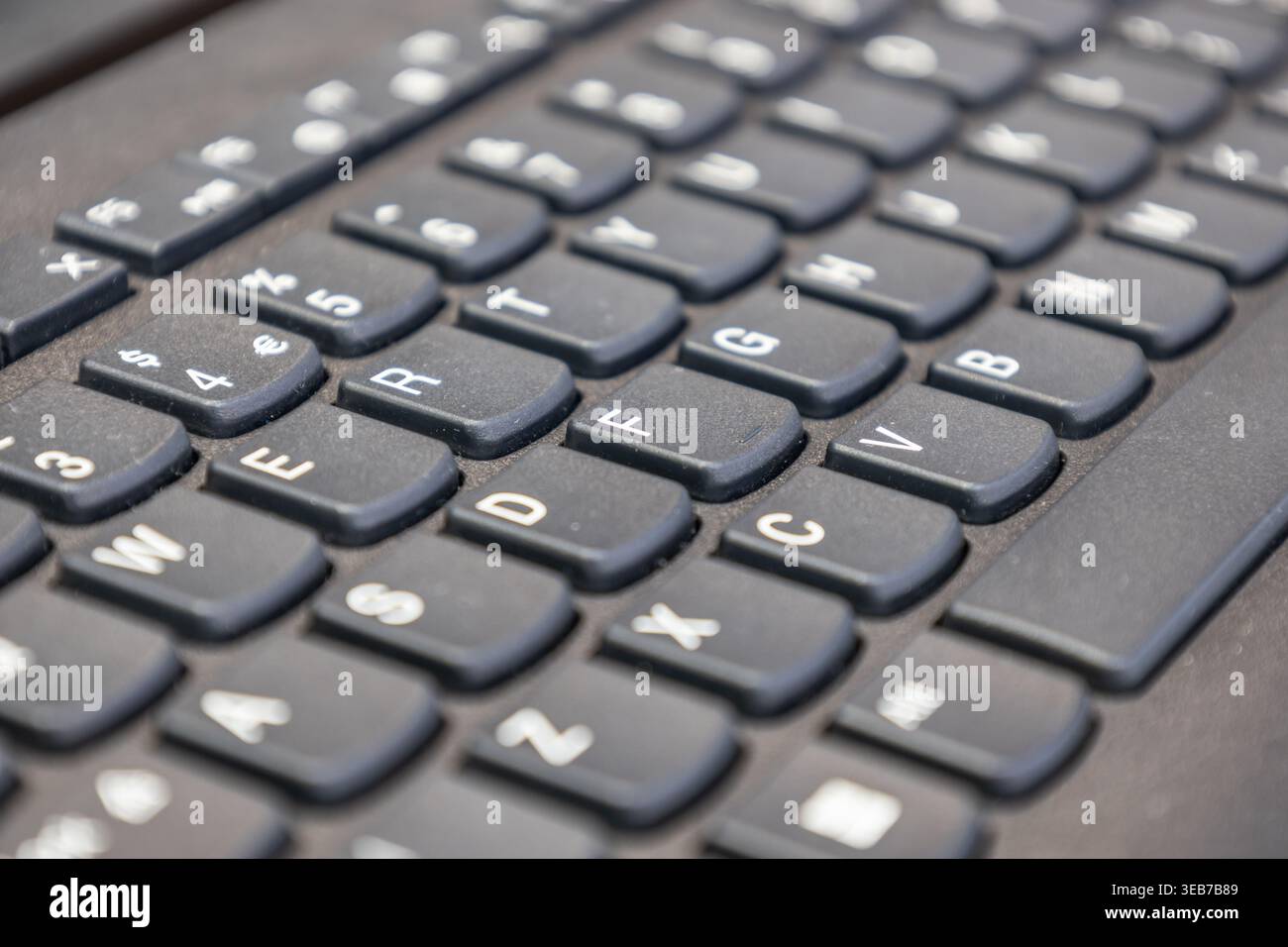 Close up view of a modern black laptop keyboard Stock Photo