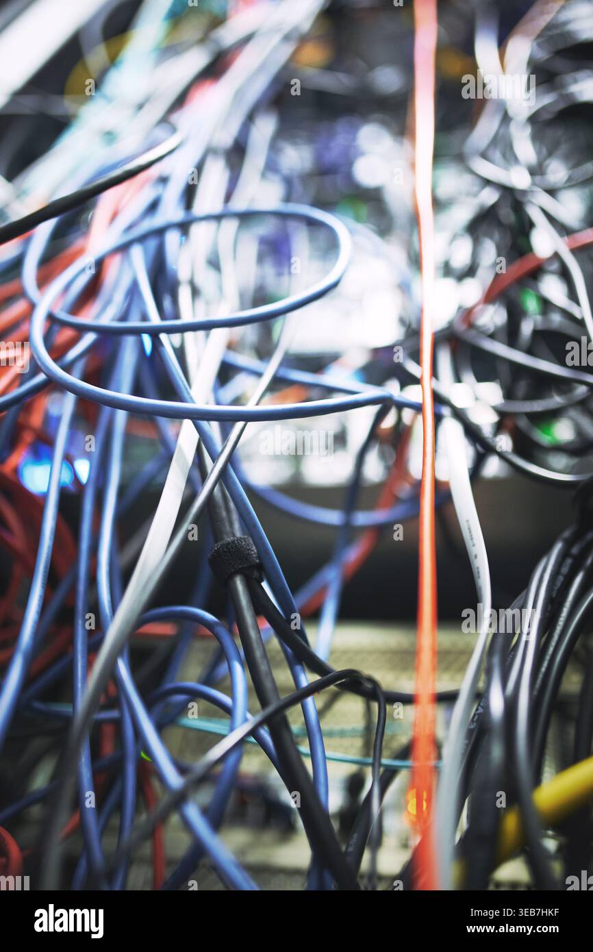 Closeup, rack and ethernet wire in server room for database, IT infrastructure and backup system. Hardware, mainframe and optical panel with Stock Photo