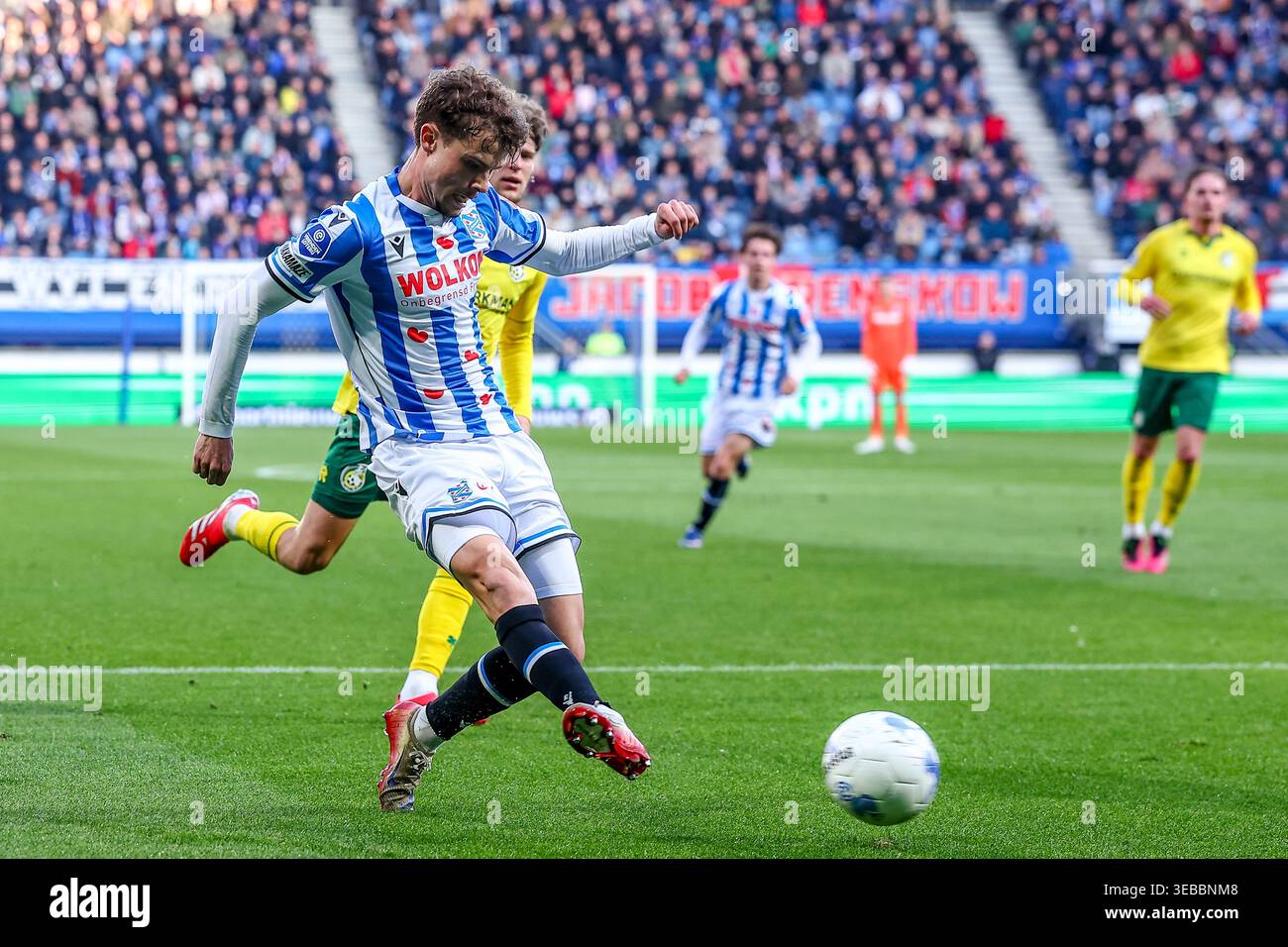 Jacob Trenskow of SC Heerenveen passes the ball under pressure from Robin  Propper of FC Twente during the Dutch Eredivisie match between FC Twente  and SC Heerenveen at De Grolsch Veste Stadium