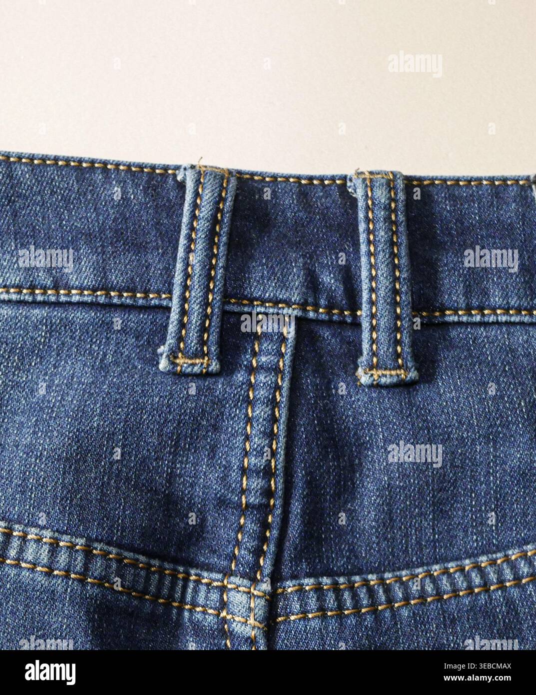 Back waistband of blue denim jeans Stock Photo