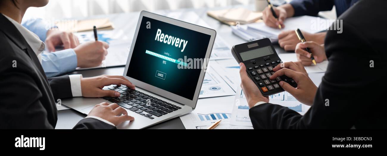 Business intelligence and data analysis concept. Analyst team working on financial data analysis dashboard on laptop screen as marketing indication Stock Photo