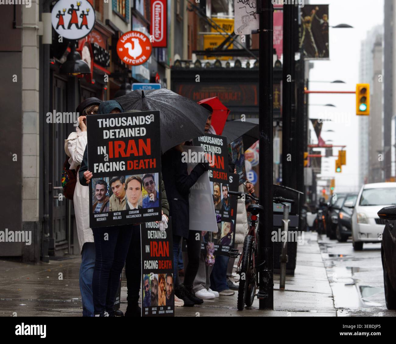Toronto, Canada. 25th Apr, 2026. Demonstrators line up along Yonge ...