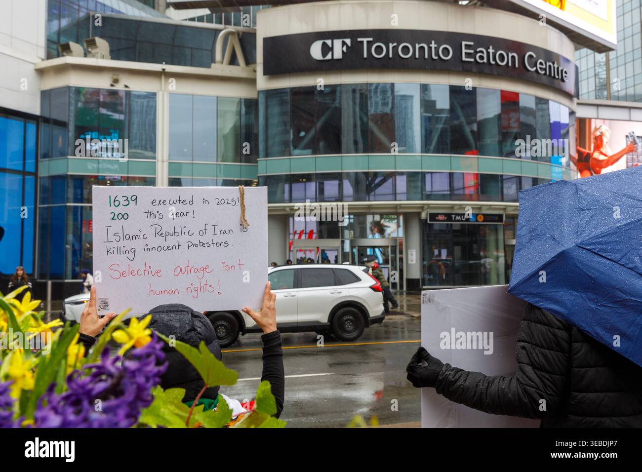 Toronto, Canada. 25th Apr, 2026. Demonstrators line up along Yonge ...