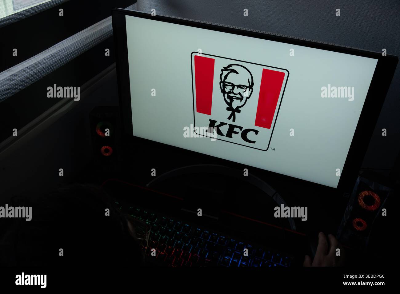 The KFC corporate logo featuring Colonel Sanders is displayed on a ...