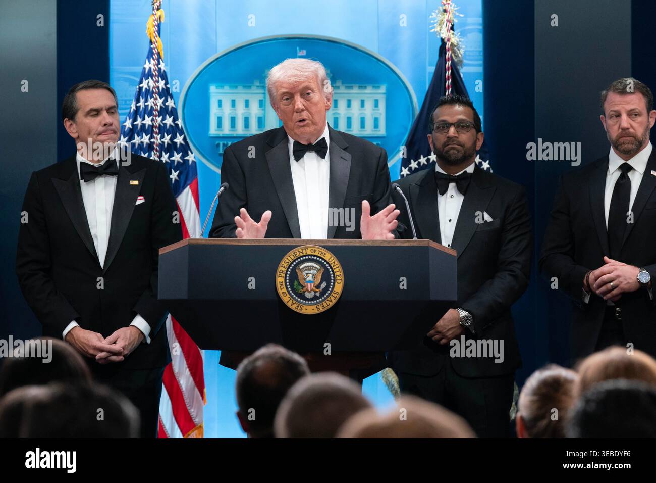 President Donald Trump speaks in the James Brady Press Briefing Room at the White House after a shooting incidental outside the ballroom at the annual White House Correspondents' Association Dinner in Washington, Saturday, April 25, 2026, as first lady Melania Trump listens at left, acting Attorney General Todd Blanche, FBI director Kash Patel and Homeland Security Secretary Markwayne Mullin, listen. (AP Photo/Jose Luis Magana) Stock Photo