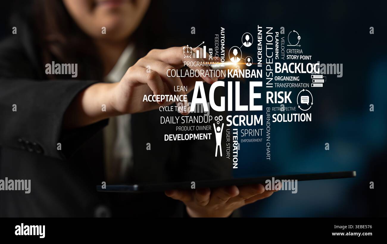 A business professional interacts with a tablet showcasing agile concepts. This image emphasizes modern strategies for project management Stock Photo