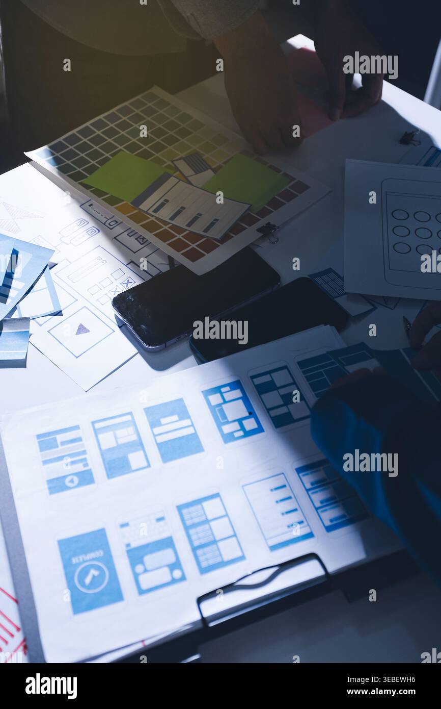 Team of Program Developer Collaborating on UXUI Design Planning in a Modern Office Environment Stock Photo