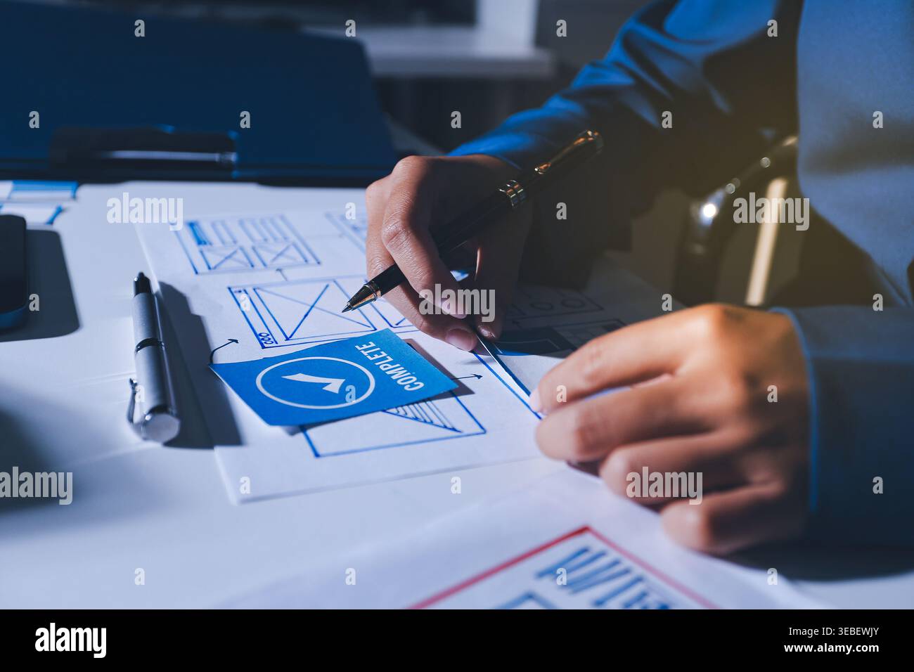 Team of Program Developer Collaborating on UXUI Design Planning in a Modern Office Environment Stock Photo