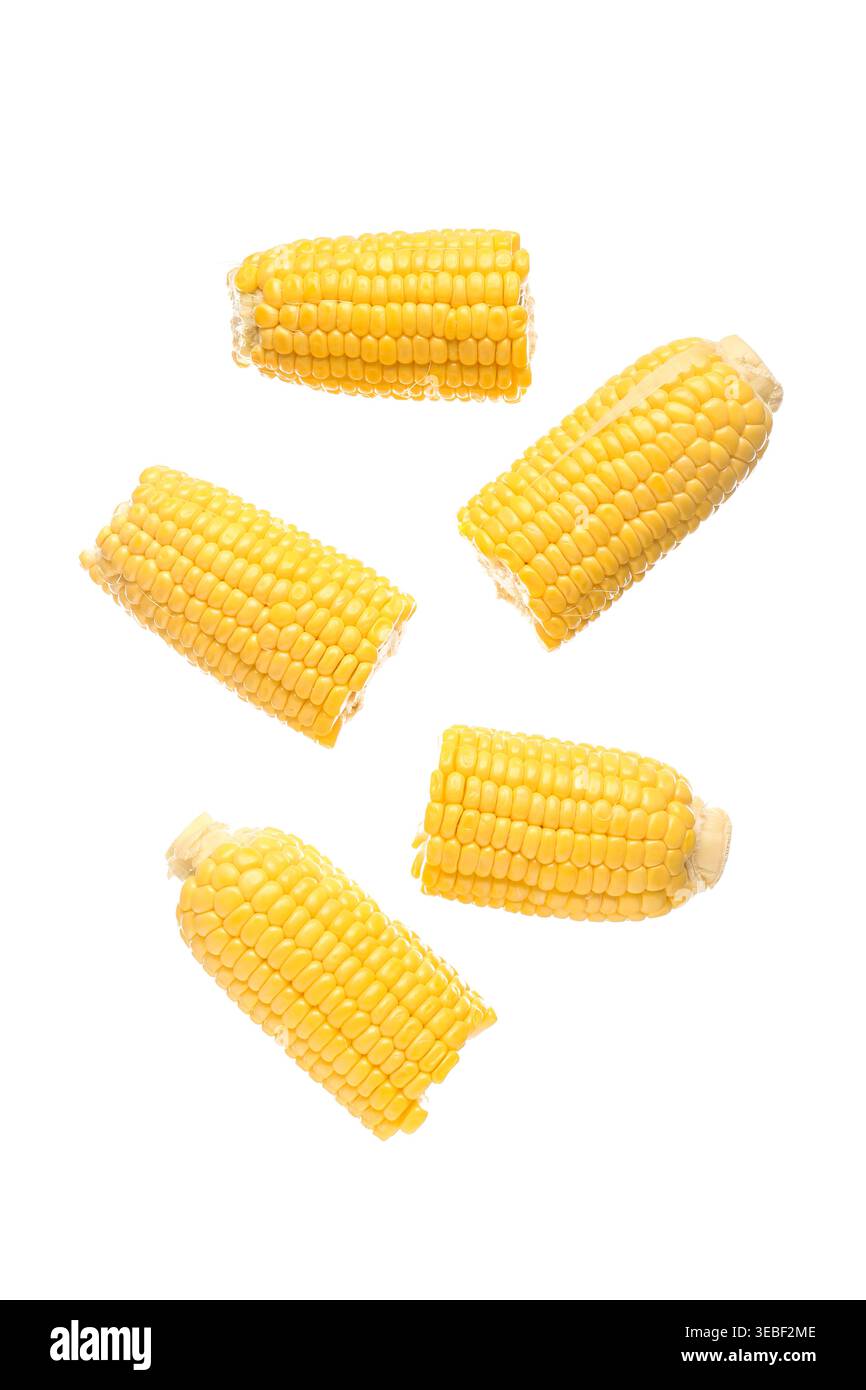 Cut fresh corn cobs on white background Stock Photo