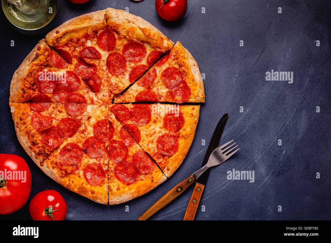 Hot homemade Pepperoni pizza, top view. Stock Photo