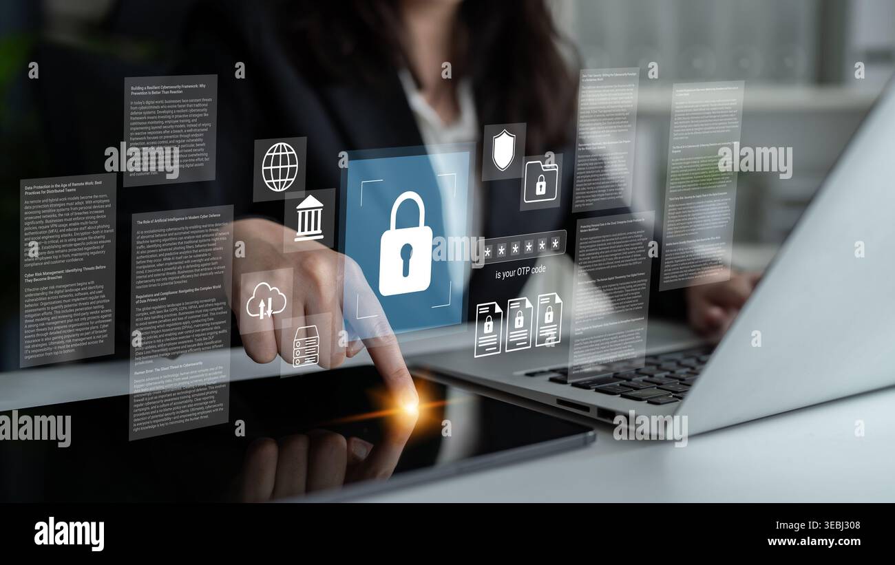 A professional woman engages with a laptop, surrounded by digital graphics representing security and data protection in a modern workspace Stock Photo