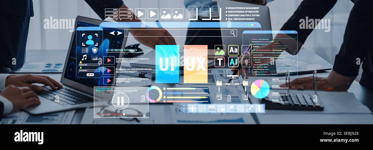 Modern Digital Interface with User Interface and User Experience Concepts Displayed on a Screen During a Collaborative Meeting in an Office Setting Stock Photo
