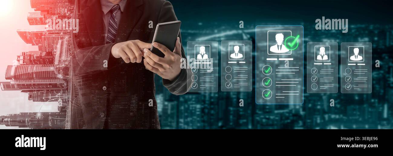 Businessman Using Digital Technology to Manage Online Profiles and Data Visualization in Urban Landscape at Night Sigmoid Stock Photo