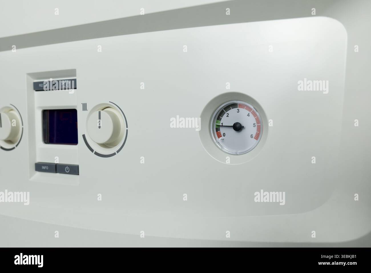 Combi gas boiler control panel with digital display. Set your house temperature. Smart  energy savings Stock Photo