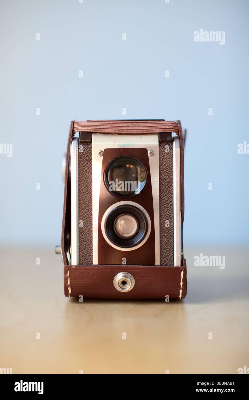 Vintage Camera Brown on blue background Stock Photo
