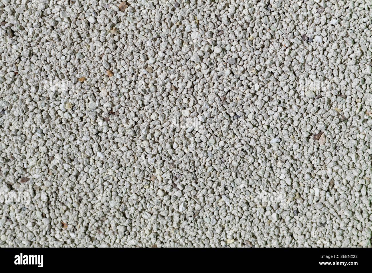 Close-up of white gravel texture with small irregular stones Stock Photo